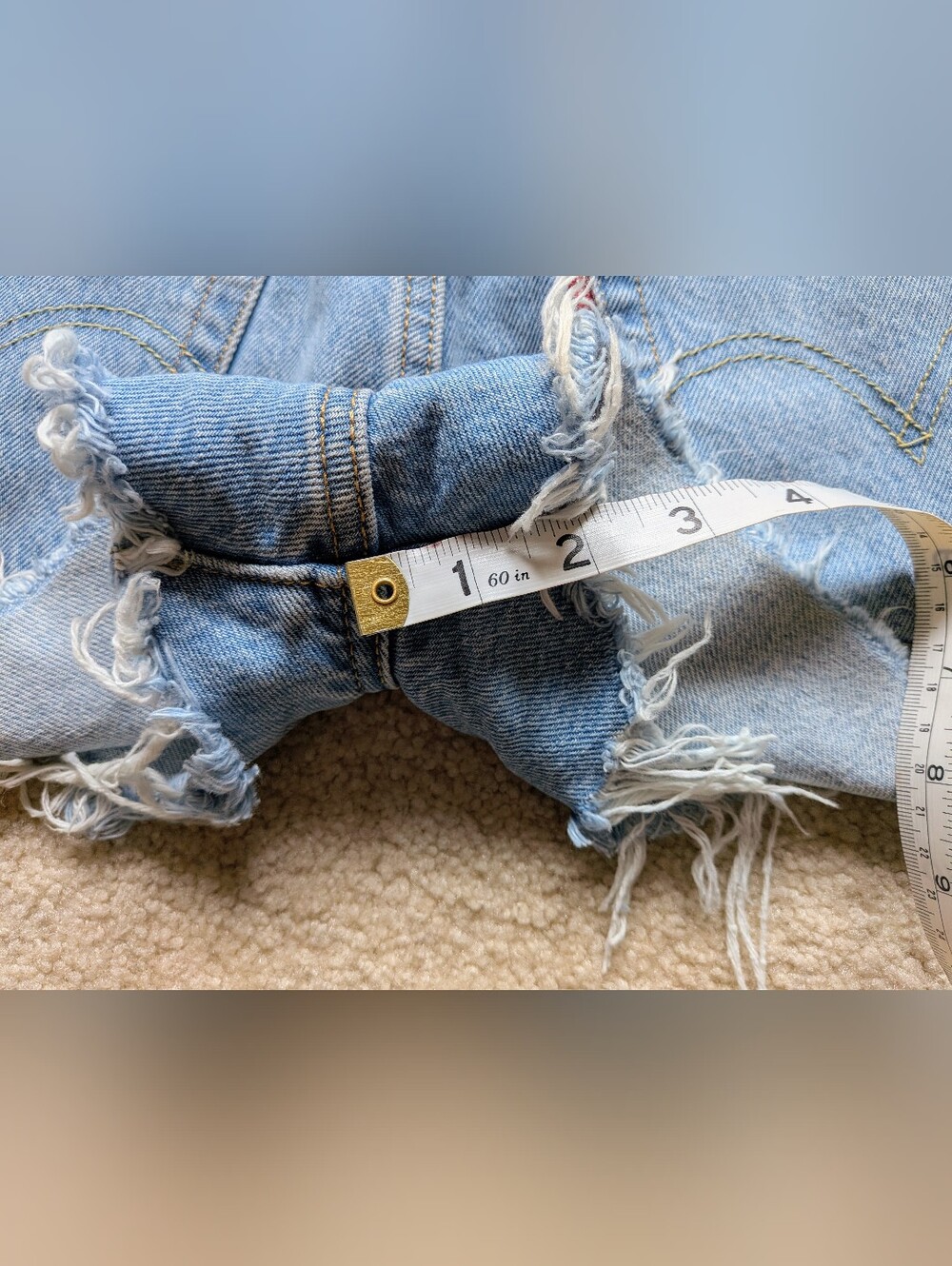Levi's Light Blue Denim Cutoff Shorts with Frayed Hem - Picture 6 of 7